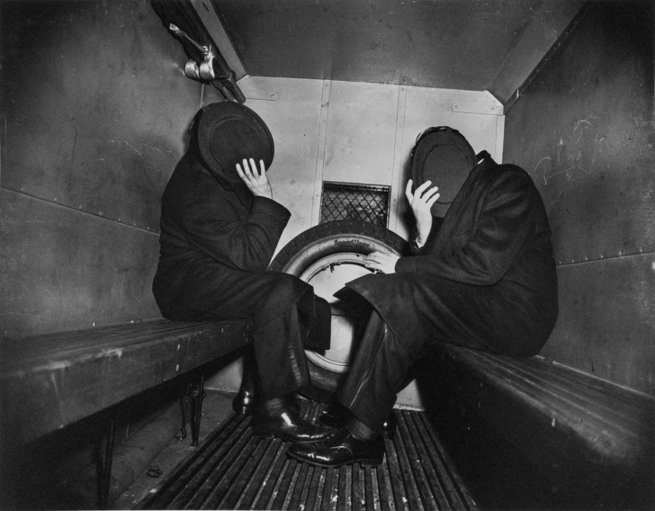 Charles Sodokoff and Arthur Webber Use Their Top Hats to Hide Their Faces, 1942 [Charles Sodokoff et Arthur Webber se cachent le visage avec leurs chapeaux hauts-de-forme, 1942]